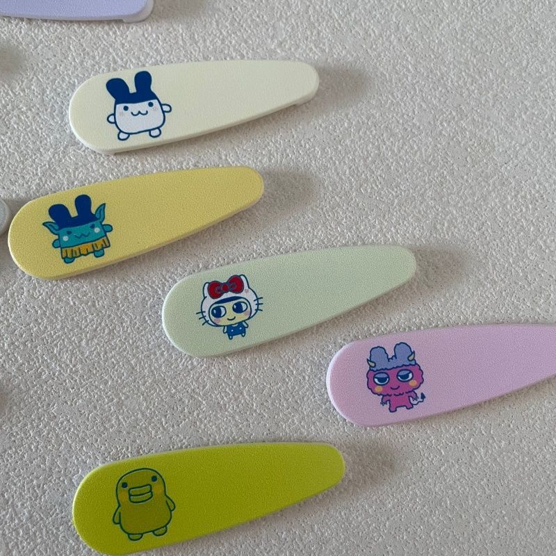 กิ๊บติดผมลายการ์ตูนทามาก็อตจิส - Tech Hair Accessories บทวิจารณ์และราคา
