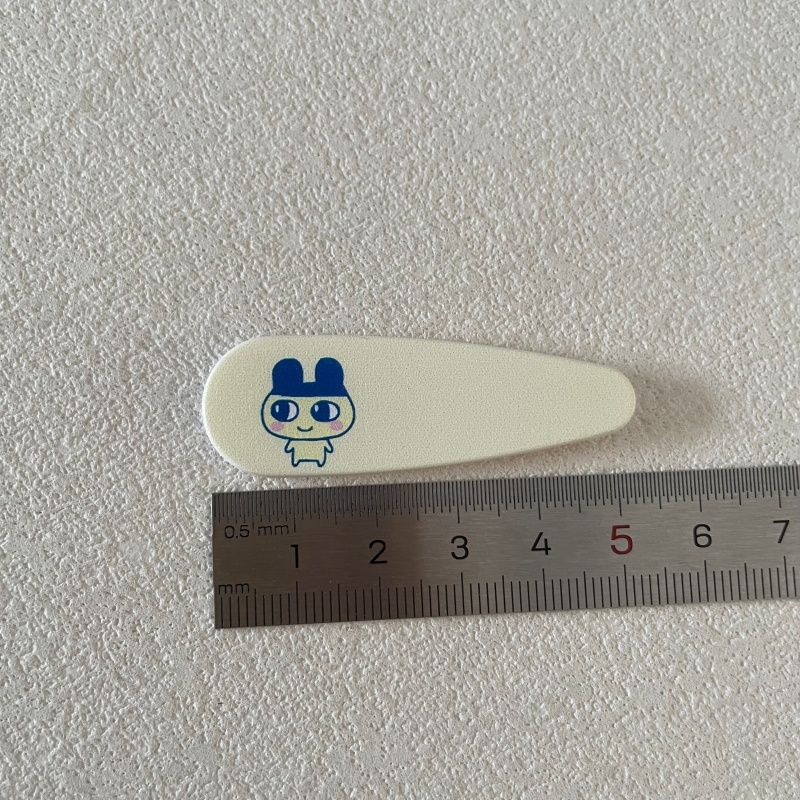 กิ๊บติดผมลายการ์ตูนทามาก็อตจิส - Tech Hair Accessories บทวิจารณ์และราคา