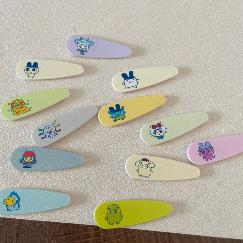 กิ๊บติดผมลายการ์ตูนทามาก็อตจิส - Tech Hair Accessories บทวิจารณ์และราคา